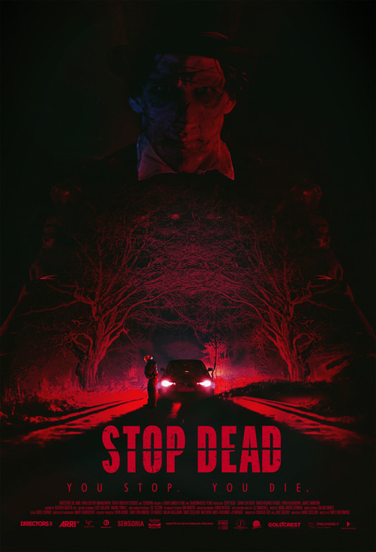 A mostly black-and-red poster for the film Stop Dead, showing a car with glowing tail-lights on a tree-lined road, and a mysterious figure looming large above it.