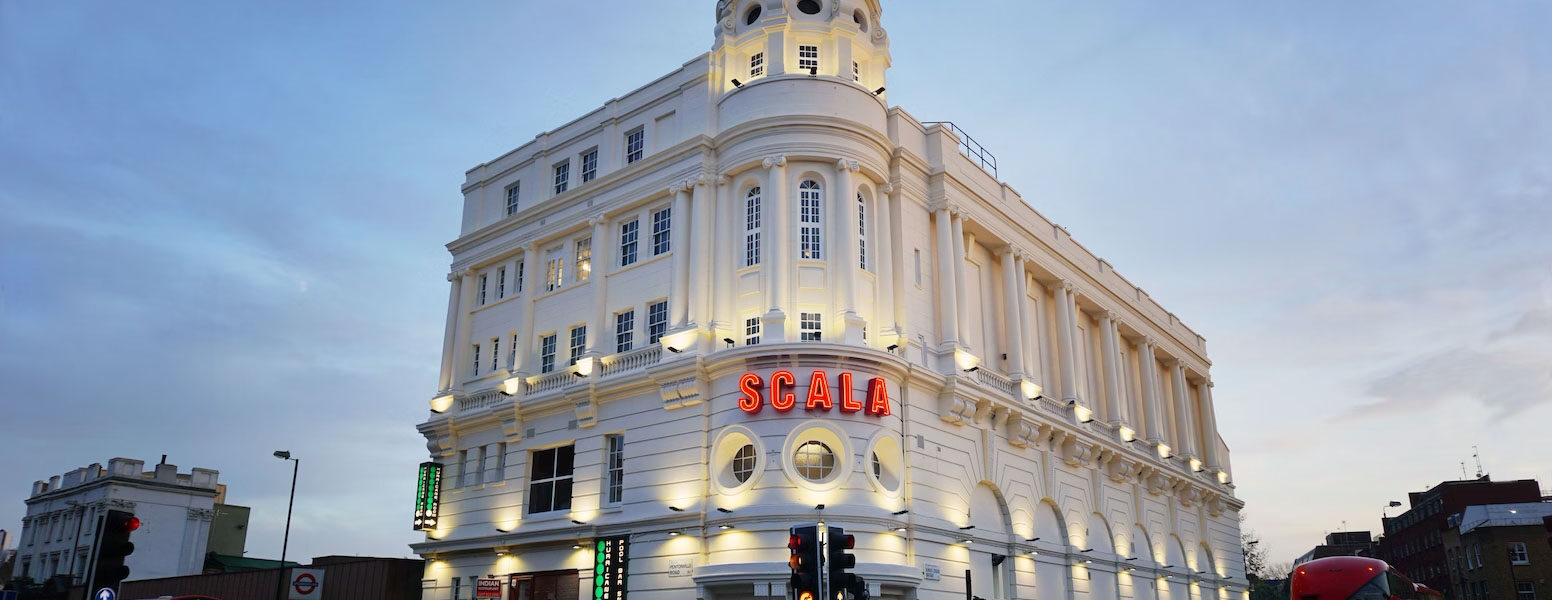 Outside shot of Scala cinema at dusk.