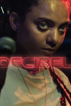 A woman by a microphone, with the title Decibel in red neon text over her.