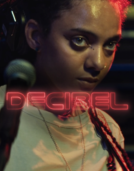 A woman by a microphone, with the title Decibel in red neon text over her.